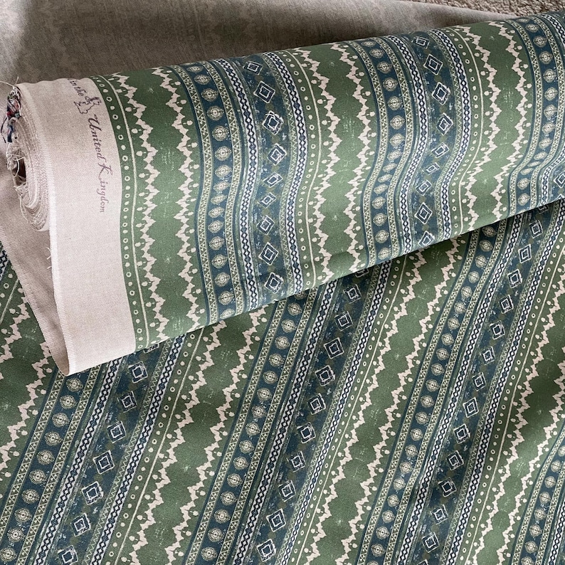 Sage green and indigo striped cotton fabric roll with geometric tribal pattern – ideal for curtains, Roman blinds, cushions, and rustic-inspired upholstery.