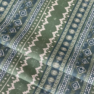 Rustic sage green and blue cotton fabric with tribal-inspired stripe and diamond motifs – perfect for farmhouse curtains, cushions, or boho upholstery projects