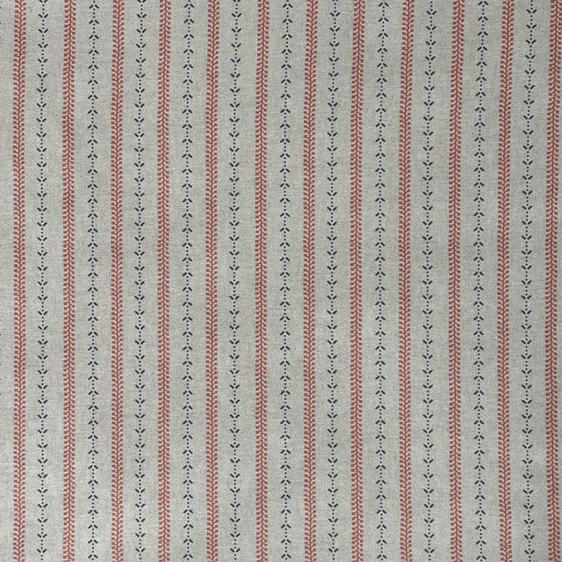 The image emphasizes the textured weave and crisp print detail, perfect for classic and cottagecore interiors.