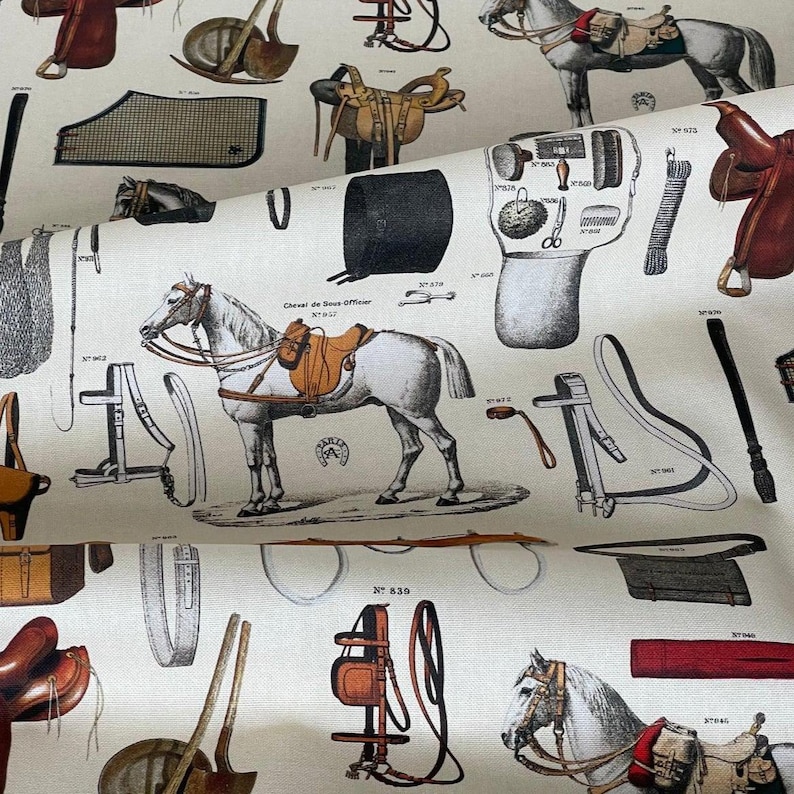 Vintage equestrian upholstery fabric with horse and saddle illustrations