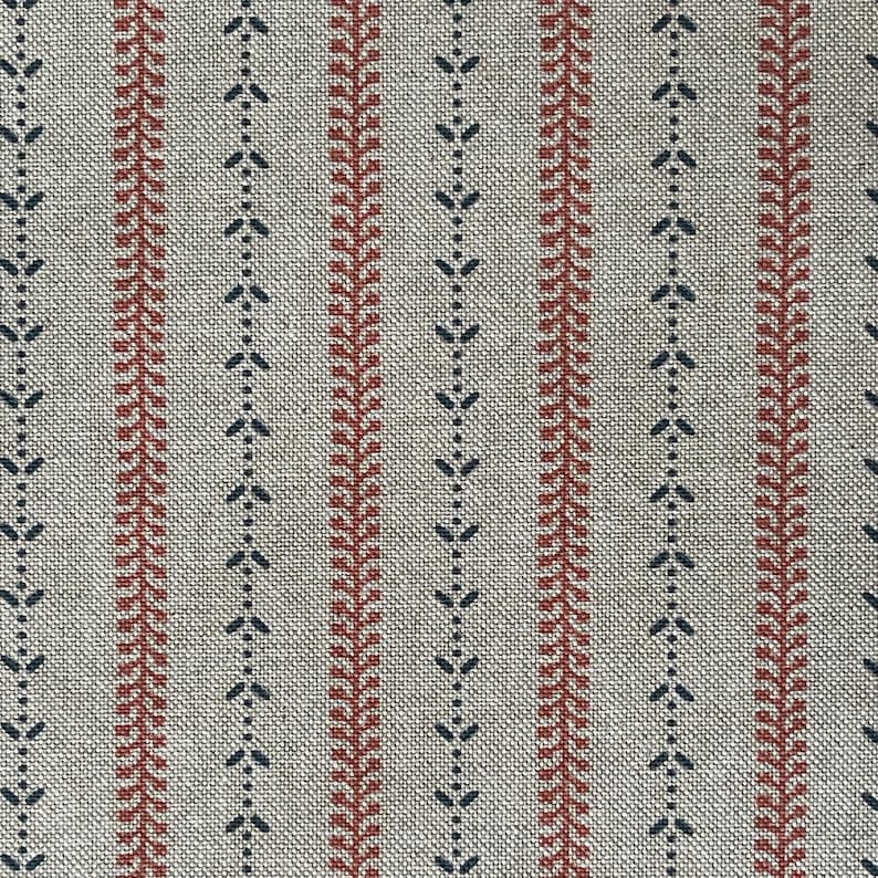 This neutral stripe textile is ideal for Roman blinds, cushions, and cottage-style curtains.