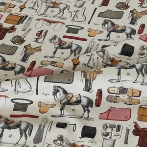 Rustic country upholstery material with saddles and bridle motifs