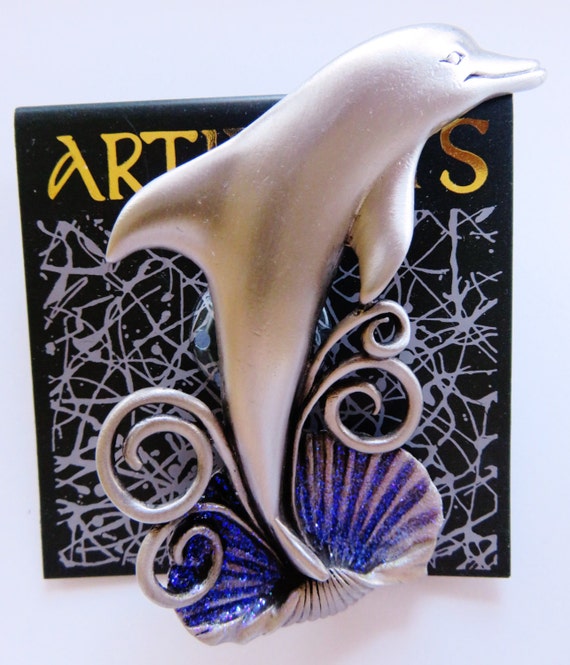 JJ Leaping Dolphin in Sea Shell With Glitter Brooc
