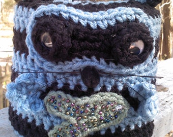 crochet,toilet paper cover,bathroom,raccoon,wildlife,animal,whimsical.