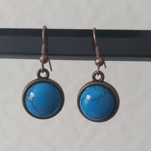 Blue cabochon, bronze setting, copper ear wires