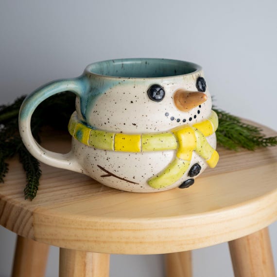 Handmade Snowman Mug: Oversized Ceramic Coffee Cup with Yellow and Green Stripe Scarf