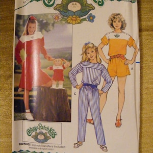 Vintage uncut Girl&#39;s Jumpsuit and matching cut Cabbage Patch Kids Clothes with partial transfers. Butterick Sewing Pattern 3085. Size 12 14