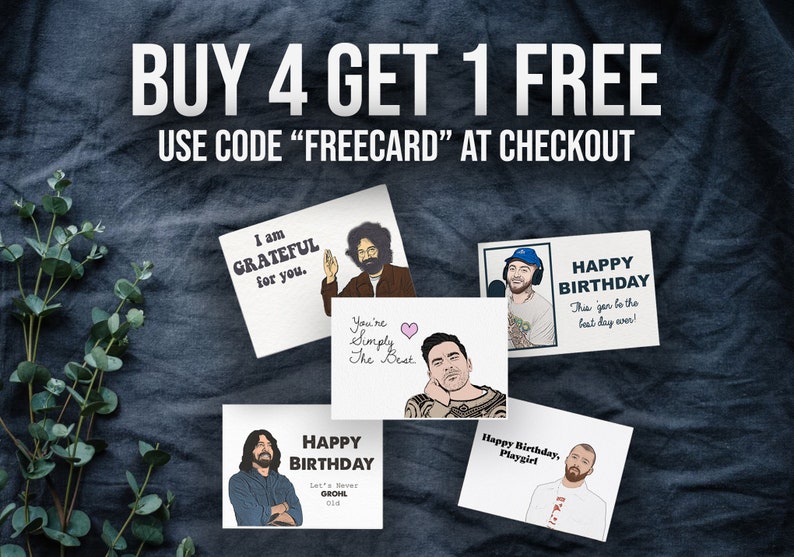 May include: Greeting cards with illustrations of famous people and phrases like "I am grateful for you" and "Happy Birthday." The cards are on a dark blue textured background. The text "BUY 4 GET 1 FREE" and "USE CODE 'FREECARD' AT CHECKOUT" are at the top.