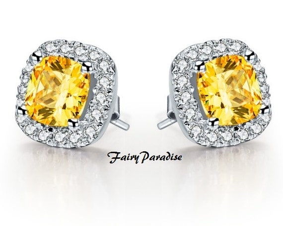 Alanis: Halo diamond earrings | Ken & Dana Design