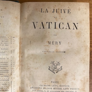 May include: A vintage book cover with the title "La Juive au Vatican" by J. Méry. The cover is printed in black ink on a cream-colored paper. The book is a new edition and was published in Paris in 1885.