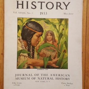 May include: A vintage magazine cover for Natural History, a journal of the American Museum of Natural History. The cover features a painting of two Native American women gathering corn in a field. The text on the cover reads "Natural History", "Vol. XXXIII, No. 3", "1933", "May-June", "Journal of the American Museum of Natural History", "Fifty Cents a Copy", "New York, N.Y.", and "Three Dollars a Year".