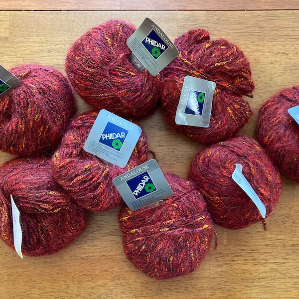 Andalouse Phildar retired red, burgundy, and orange mixed color yarn resembles a field of wild flowers at the moment the sun begins to sink