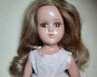 1930s Arranbee 17-inch composition bride doll with golden brown sleepy eyes and long white eyelet dress