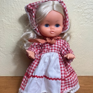 Kellogg&#39;s 1979 premium 9-inch doll (with her original red-and-white checked dress and bonnet) was fashioned as &quot;Sweetheart of the Corn&quot;