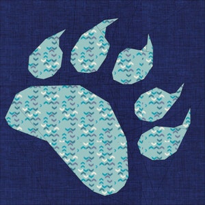 May include: A blue bear paw print with a white and blue chevron pattern. The paw print is on a dark blue background.