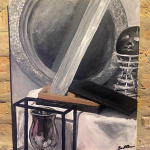 May include: A black and white still life painting featuring a round, textured object, a long, thin object, a black rectangular object, and a clear glass vase in a black metal frame.