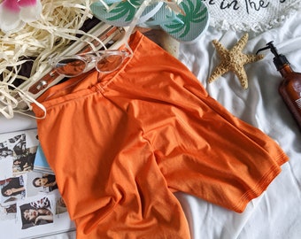 burnt orange swim trunks