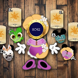 May include: A collection of colorful, cartoon-style cutouts on a wooden background. The cutouts include a princess, Mickey Mouse heads with names, a frog, a dog, and lanterns with names. The central cutout has the number 8042.