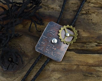 Bolo Tie;  Steampunk Style Etched Copper With Slide, Silver Tips, Black Leather Cord