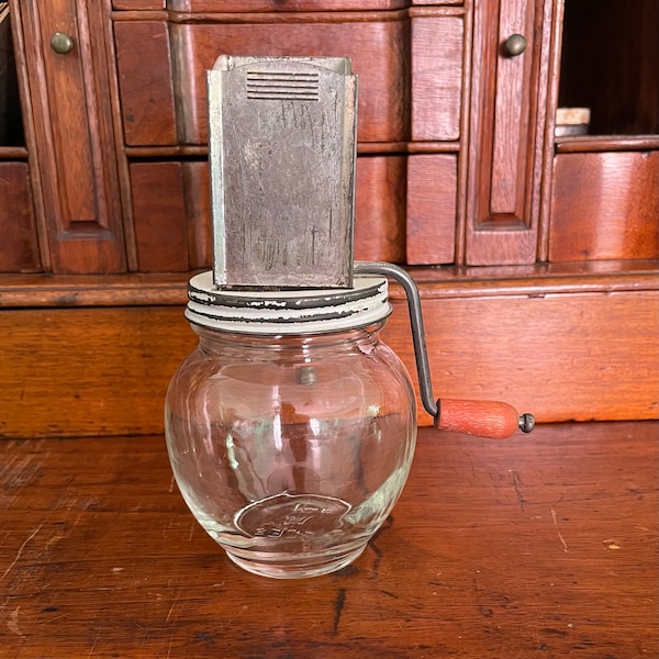 Vintage Nutmeg Spice Grinder Hazel Atlas Glass Bottom Metal Top 1940s