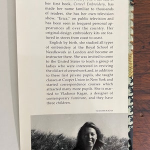 May include: A book cover featuring text about Erica Wilson, a designer and teacher of embroidery. The cover includes a black and white photo of a woman and text about her work and television show.