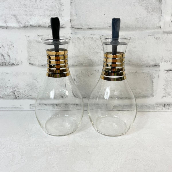 Two Vintage Glass Cruets with Gold Bands and Plastic Stopper Tops 1960s Oil Vinegar