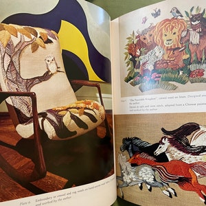 May include: A vintage rocking chair with a cream-colored upholstered seat and back, featuring an embroidered tree design with an owl. The chair has dark wooden arms and a wooden frame. The image is from a book about embroidery.