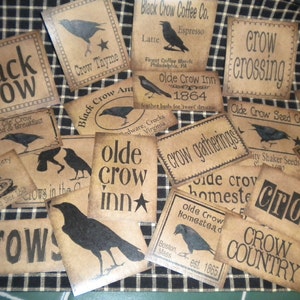 May include: A collection of vintage-style brown paper signs with black crow illustrations and text. The signs feature phrases like "Black Crow", "Crow Crossing", "Olde Crow Inn", "Crow Gatherings", and "Crow Country".