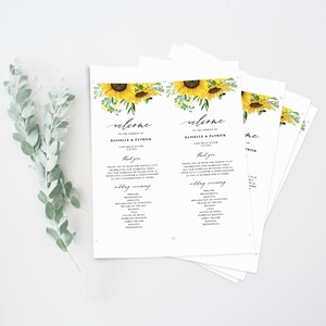 May include: A welcome sign for a wedding ceremony with a sunflower design. The sign includes the names Danielle and Patrick, the date of the wedding, and a list of the wedding ceremony events.