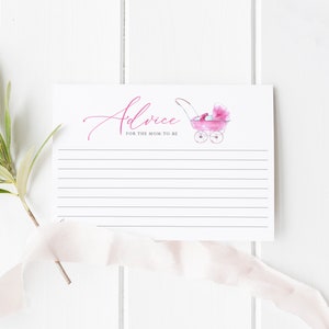 May include: A white card with pink text that says "Advice for the Mom-to-Be". A pink watercolor illustration of a baby carriage is on the right side of the card. The card has lines for writing.