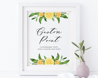 May include: White framed print featuring a watercolour illustration of lemons and green leaves. The text "Custom Print" is written in black cursive font. Below the text is the phrase "Customizable texts, texts colours and fonts".