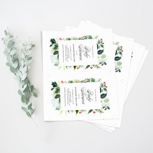 Peut inclure: Une pile de cartes blanches avec une bordure florale verte et rouge. Le texte sur les cartes indique "Vous &ecirc;tes invit&eacute; &agrave; une Baby Shower en l'honneur d'Eleanor Phillips, le 4 d&eacute;cembre &agrave; 14h. La f&ecirc;te aura lieu &agrave; [adresse]. Veuillez confirmer votre pr&eacute;sence avant le [date]."