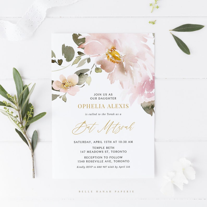 May include: A floral-themed invitation for a Bat Mitzvah. The invitation features a watercolor illustration of pink flowers and greenery. The text reads "Join us as our daughter Ophelia Alexis is called to the Torah as a Bat Mitzvah" and includes the date, time, and location of the event.