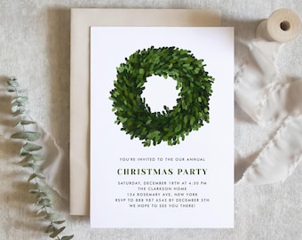 May include: A white invitation card with a green wreath illustration. The text reads "You're invited to our annual Christmas Party, Saturday, December 18th at 4:30 PM, The Clarkson Home, 154 Rosemary Ave, New York, RSVP to 888 987 6543 by December 5th, We hope to see you there!"