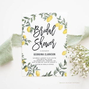 May include: A white bridal shower invitation with a watercolor illustration of lemon branches and leaves. The text reads "Bridal Shower" in black script font, followed by "In Honour Of Georgina Clarkson". The invitation details the date, time, location, RSVP information, and hosts.
