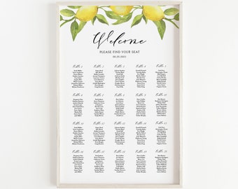 May include: A white framed seating chart with a watercolor lemon design. The chart lists guest names by table number for a wedding on August 25, 2021. The text "Welcome, Please Find Your Seat" is at the top of the chart.