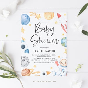 May include: A baby shower invitation with a watercolor illustration of a rocket, planets, and a baby astronaut. The text reads "Baby Shower" in honor of Camille Lawson. The invitation includes the date, time, location, RSVP information, and registry details.