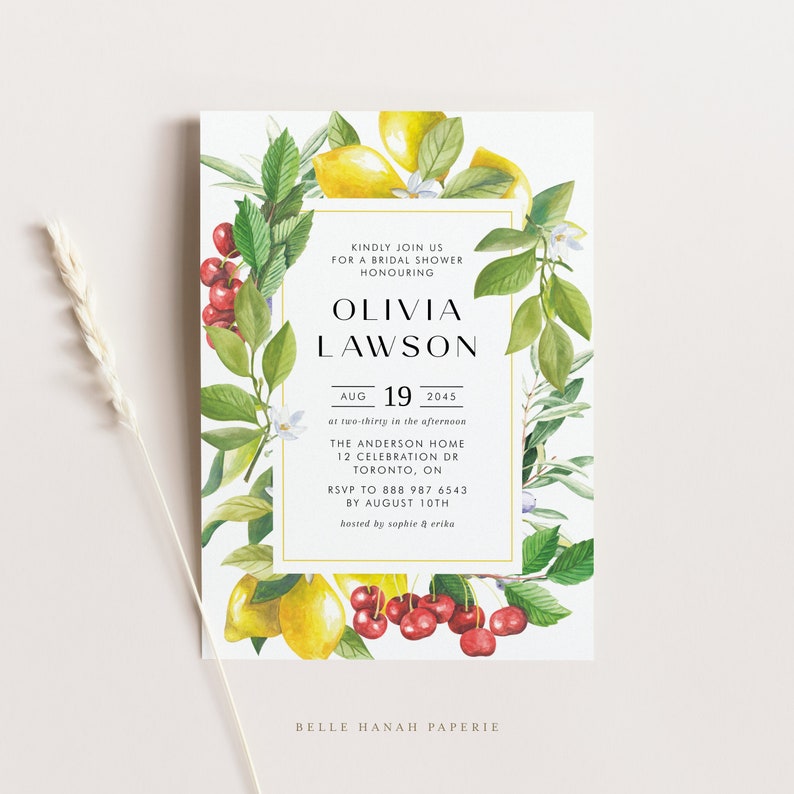 May include: A white bridal shower invitation with a watercolor illustration of lemons, cherries, and greenery. The text reads "Kindly join us for a bridal shower honouring Olivia Lawson, Aug 19, 2045 at two-thirty in the afternoon, The Anderson Home, 12 Celebration Dr, Toronto, ON, RSVP to 888 987 6543 by August 10th, hosted by Sophie & Erika, Belle Hanah Paperie."