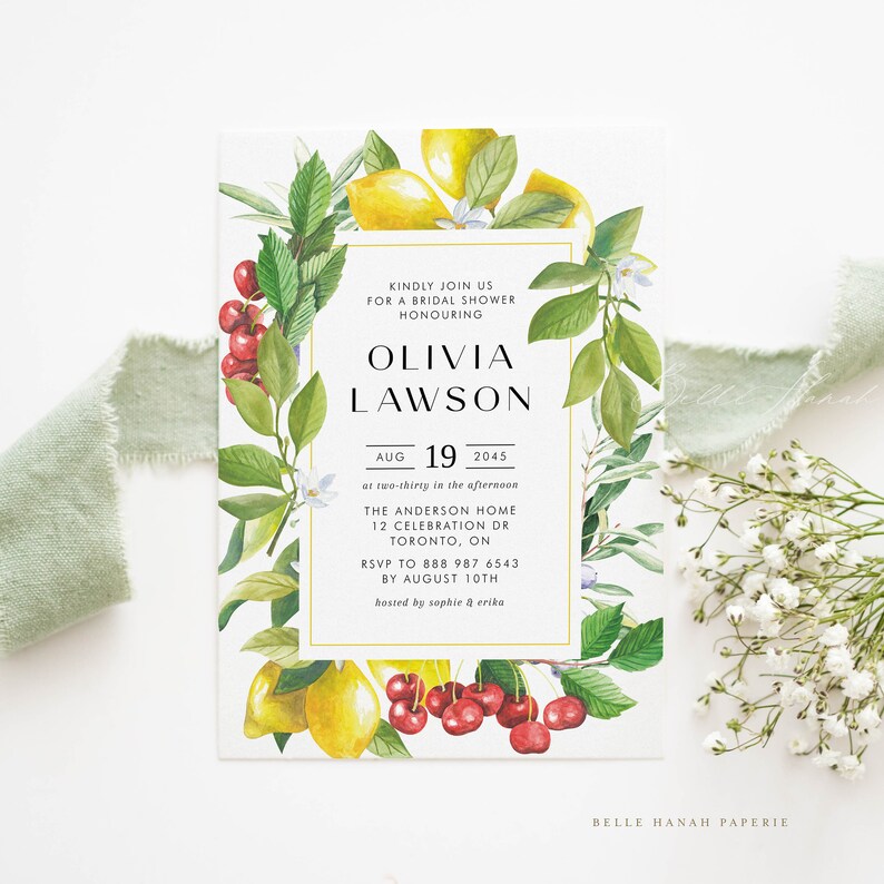 May include: A watercolor illustration of lemons, cherries, and greenery with a gold frame. The text reads "Kindly join us for a bridal shower honoring Olivia Lawson, Aug 19, 2045 at two-thirty in the afternoon, The Anderson Home, 12 Celebration Dr, Toronto, ON, RSVP to 888 987 6543 by August 10th, hosted by Sophie & Erika, Belle Hanah Paperie".