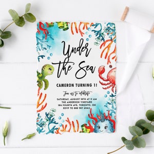 May include: Under the Sea themed birthday party invitation with a watercolor illustration of a turtle, crab, and narwhal. The invitation includes the text "Under the Sea", "Cameron Turning 1!" and details for the party.