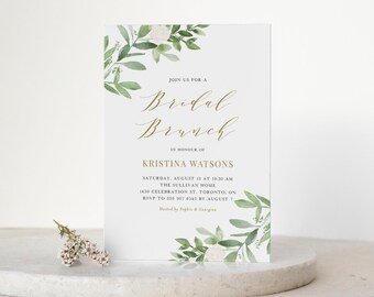 May include: A white card with green watercolor leaves and white flowers. The text on the card reads "Join us for a Bridal Brunch in honor of Kristina Watsons. Saturday, August 18 at 10:30 am. The Sullivan Home, 1450 Celebration St. Toronto, ON. RSVP to 555 957 6543 by August 7. Hosted by Sophie & Georgina. Belle Hanah Paperie."
