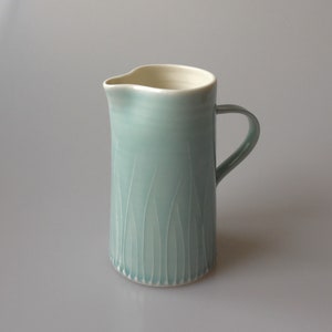 Tall light blue porcelain jug