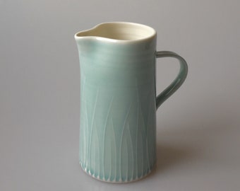 Tall light blue porcelain jug
