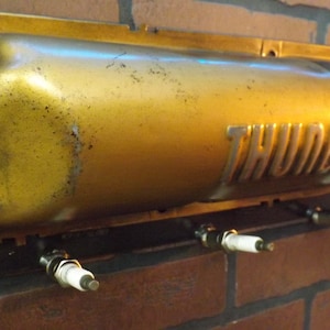 Ford Thunderbird valve cover coat rack.