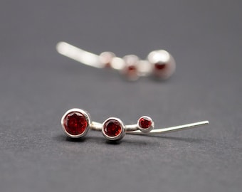 Red cubic zirconia ear climbers