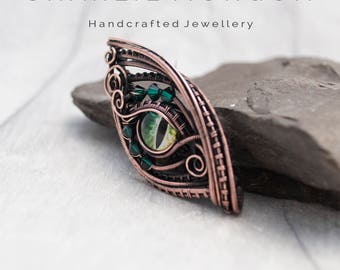 Emerald green Dragon Eye pendant or brooch