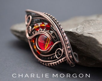 Fire dragon eye pendant or brooch