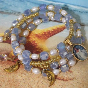 Yemaya Bangle bracelet, Yemonja pearl and blue crystal beads with Yemaya image on a frame
