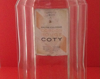 Vintage French Large Bottle Glass Water Toilette "COTY CORDON ROUGE"  Cap is Red Bakelite