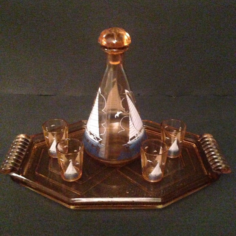 French vintage liqueur set complete in pink Tray with a boat Four Glass art glass deco 50s